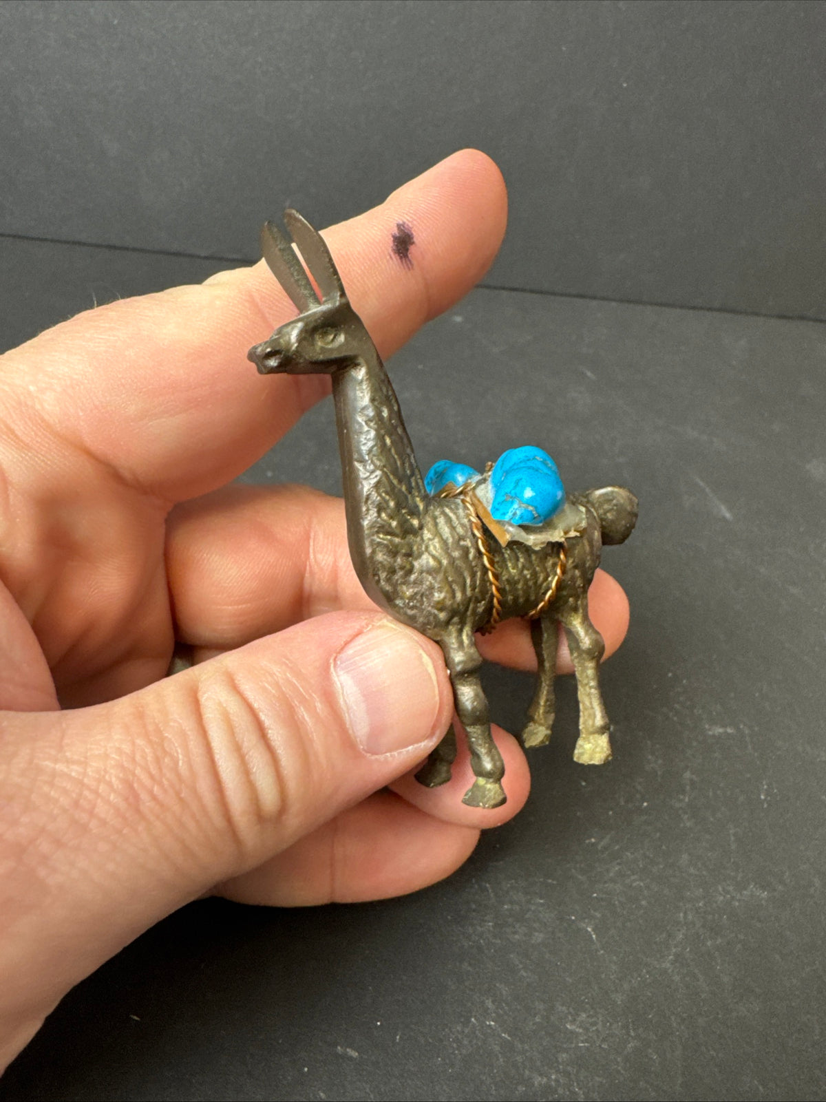 477 - Miniature Brass? Llama / Alpaca Figurine Carrying Turquoise Stone Copper Saddle