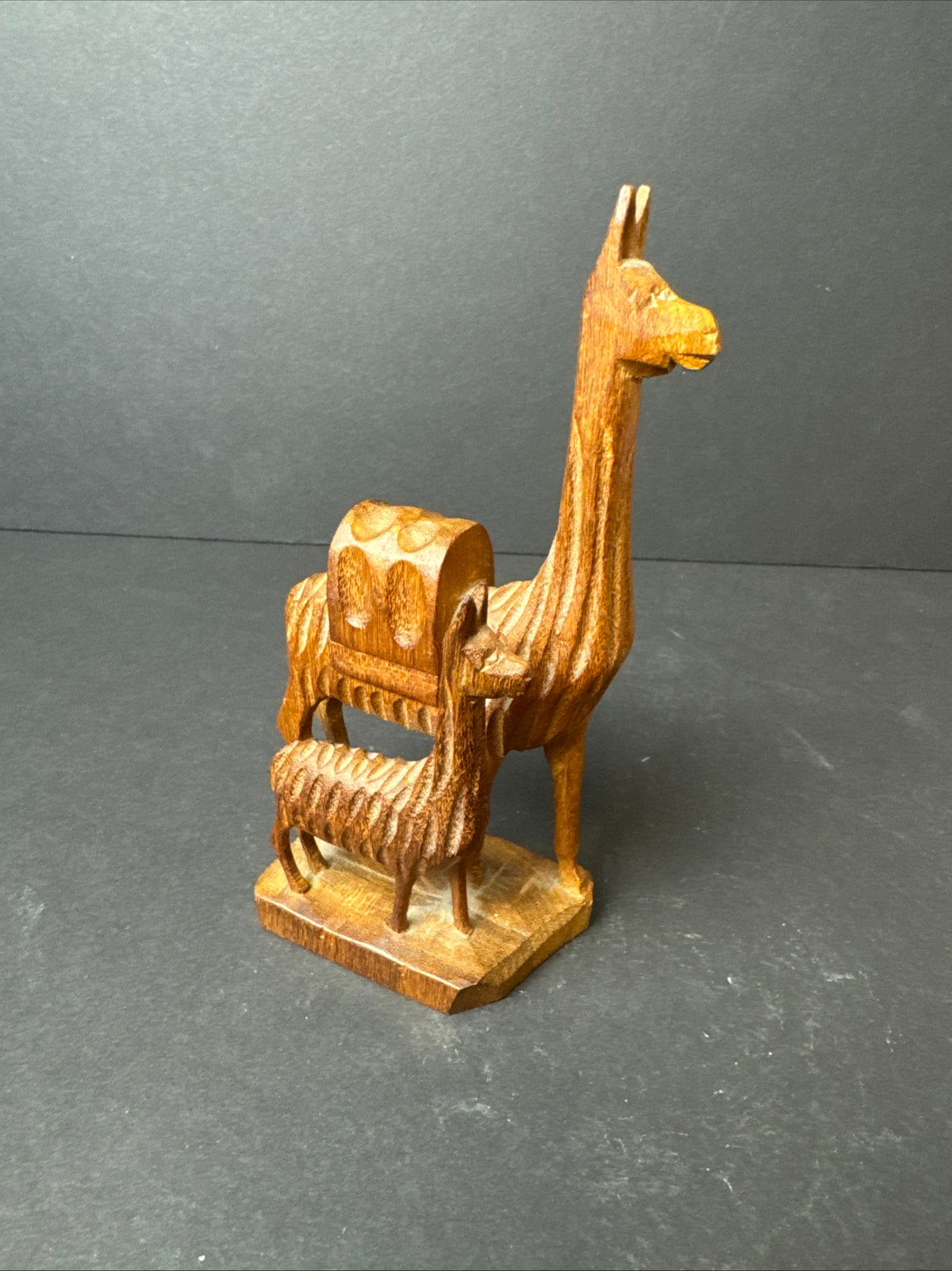 476 - Hand-Carved Wooden Figurine featuring mother Llama and baby Llama folk art