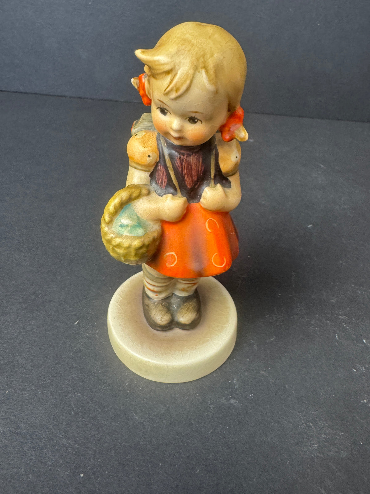 499 - Goebel Hand Painted Girl with Basket Porcelain Figurine Multicolor 1970s?