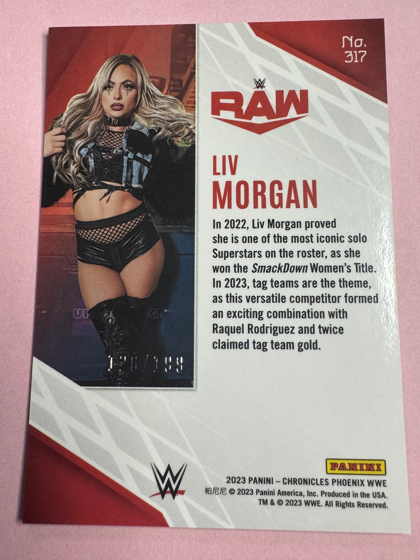 2023 Panini Chronicles WWE Liv Morgan #317 Phoenix Pink 126/199