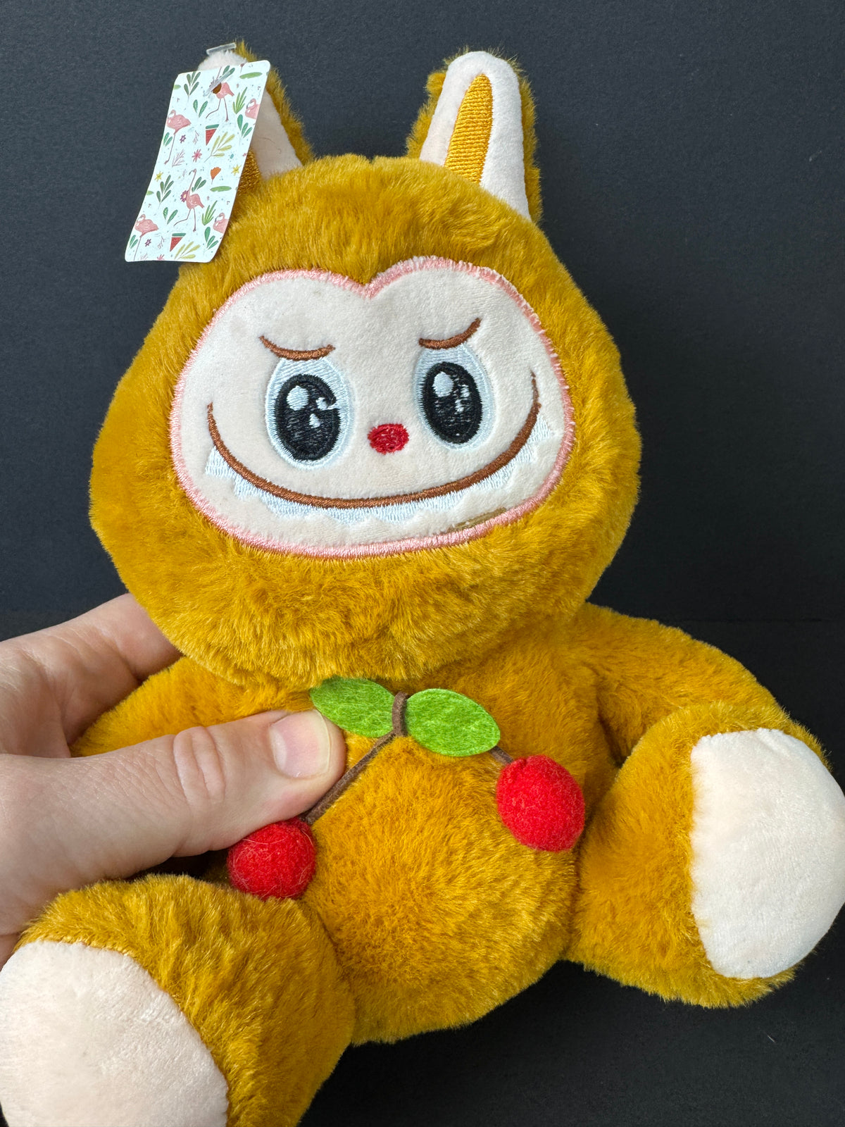 566 - generic labubu looking plush, tag is in Chinese