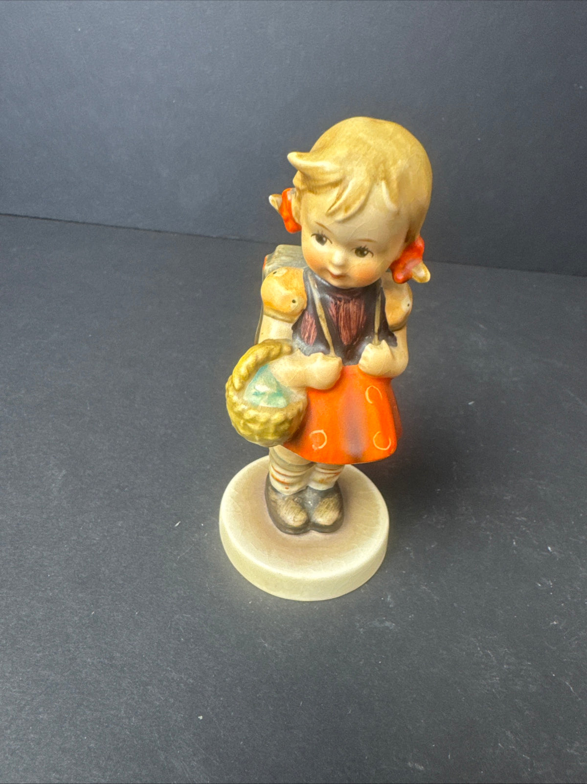 499 - Goebel Hand Painted Girl with Basket Porcelain Figurine Multicolor 1970s?