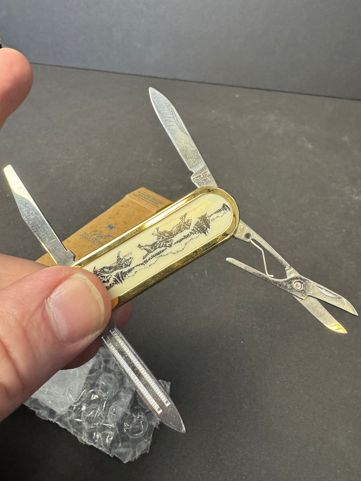 144 - Avon Collectable Running Wolves Pocket Knife Keychain Multi-Function Knife NEW