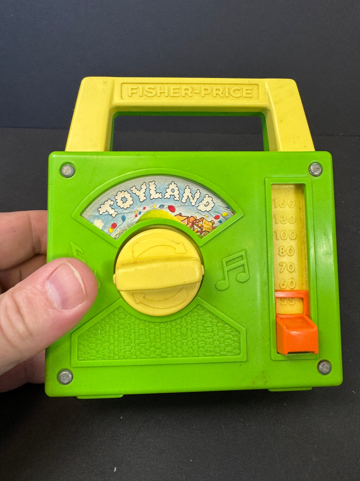 606 - 1960 Fisher-Price Toyland Music Box Green Yellow Carry Handle MPN 795, WORKS