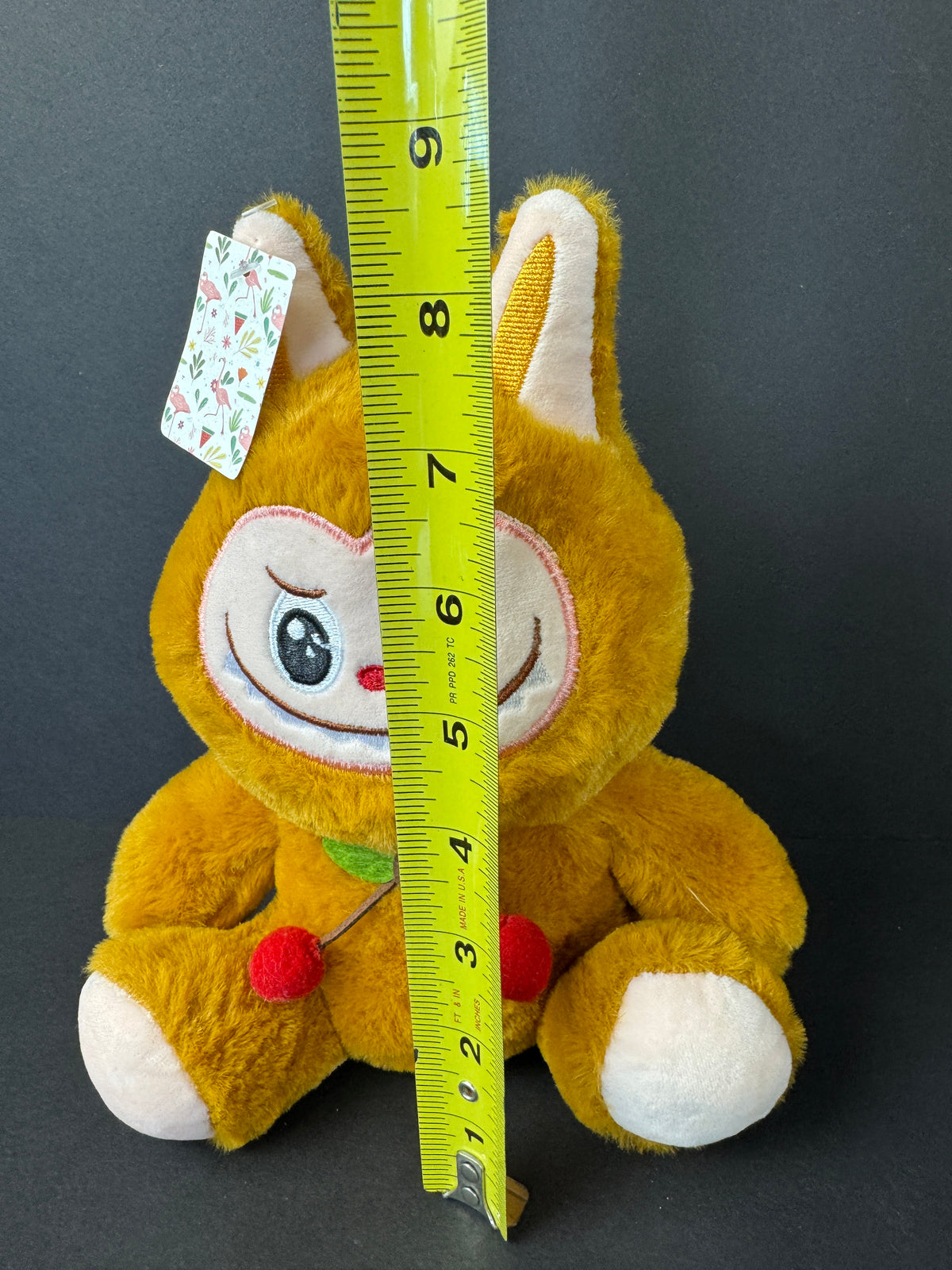 566 - generic labubu looking plush, tag is in Chinese
