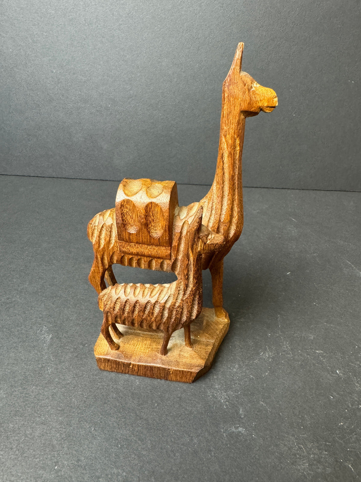476 - Hand-Carved Wooden Figurine featuring mother Llama and baby Llama folk art