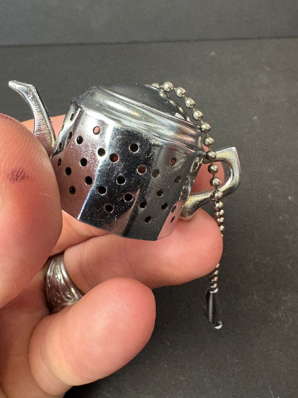 488 - Vintage Shiny Silvertone Tea Holder Strainer Teapot Shape Saucer Chain Tulip Tip