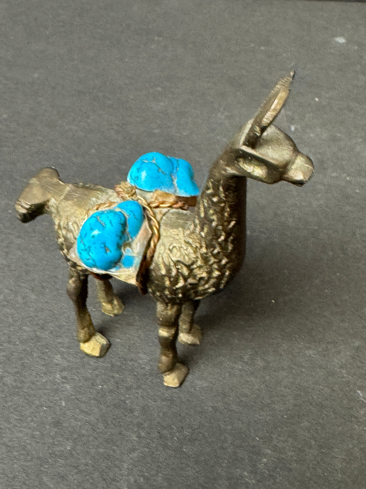 477 - Miniature Brass?  Llama / Alpaca Figurine Carrying Turquoise Stone Copper Saddle