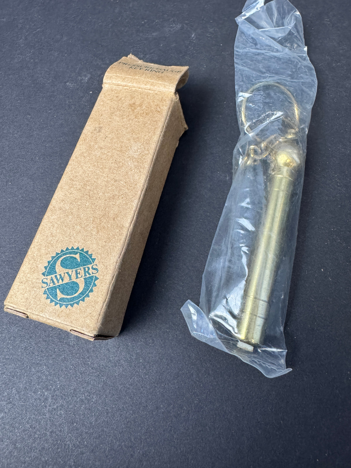 126 - Sawyers - Avon Products - "Pressure Gauge Key Ring" - New In Box
