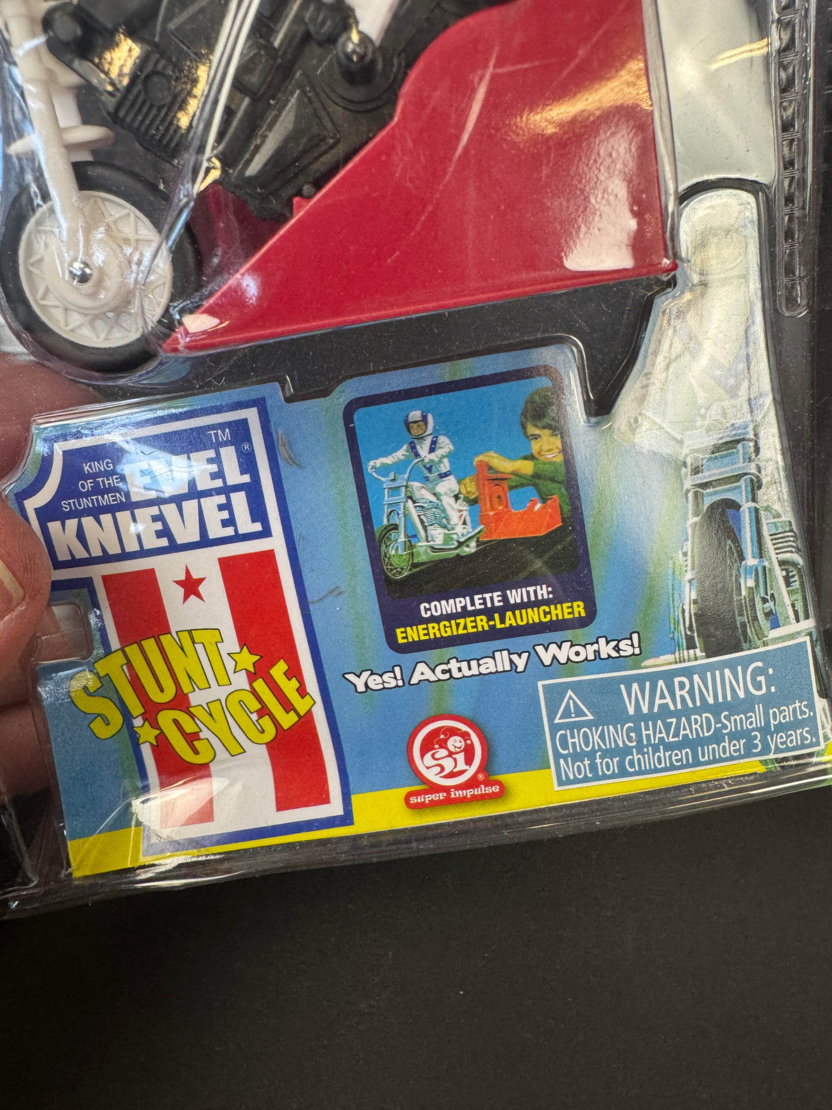 235 - WORLDS SMALLEST Evel Knievel Stunt Cycle Toy- Energizer Launcher-Trail Bike